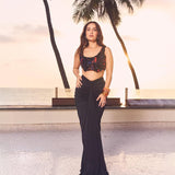 Kusha Kapila in the Noir draped skirt